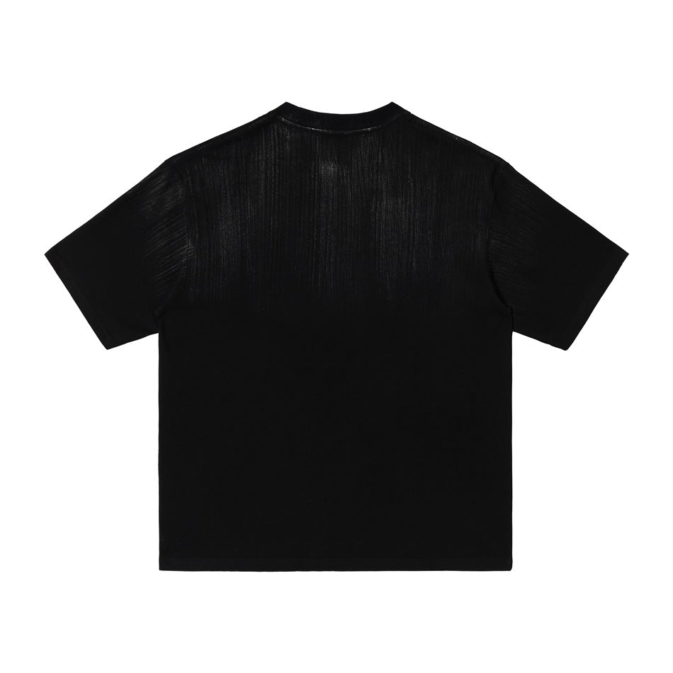 Back view of a plain black short-sleeve crew-neck T-shirt with subtle streaked detailing.