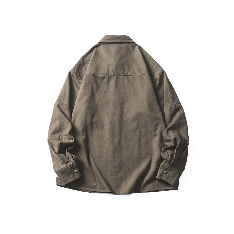 Back view of an olive-brown shirt with a yoke seam, long sleeves, and button cuffs, laid flat on white.