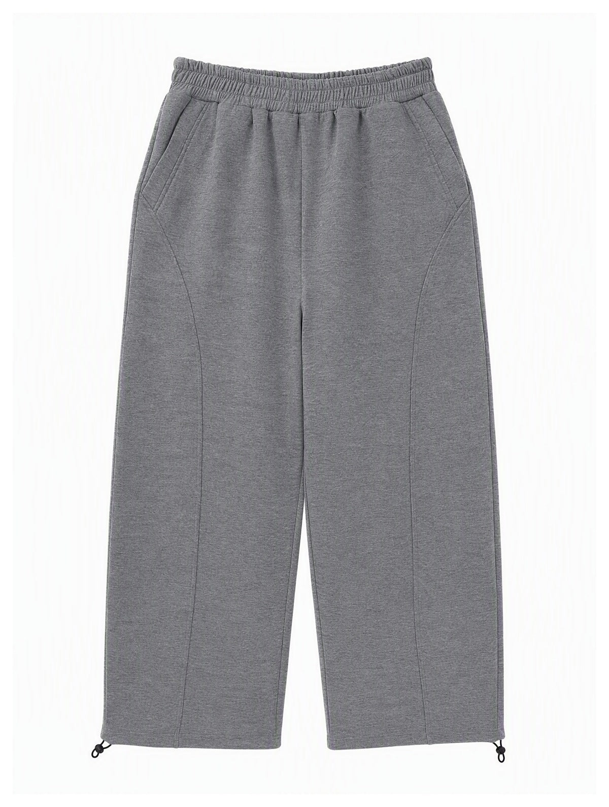 Front view of gray wide-leg pants with an elastic waistband, angled front pockets, curved seams, and adjustable ankle ties.