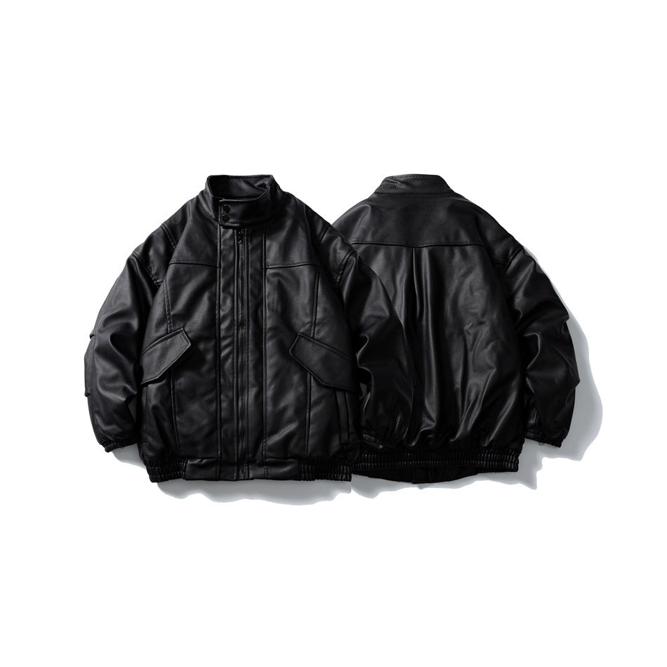 Black jacket displayed from the front and back, with a snap collar, front zipper, flap pockets, and elastic trim.