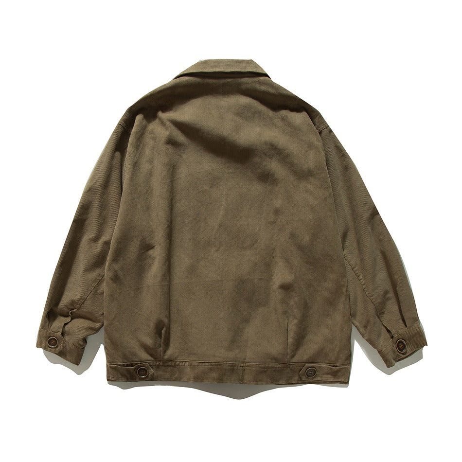 Back view of a brown jacket with a plain panel, buttoned cuffs, and adjustable hem tabs.