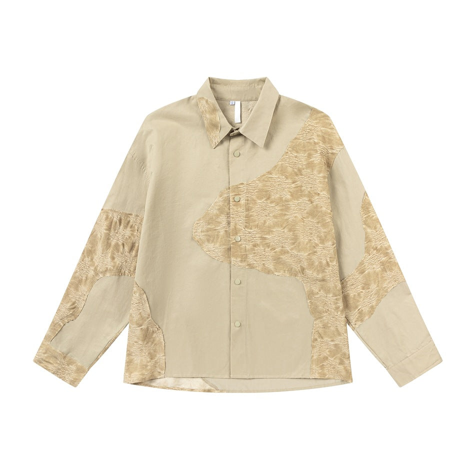 Yellow long-sleeve button-front shirt with textured patchwork panels, flat front view