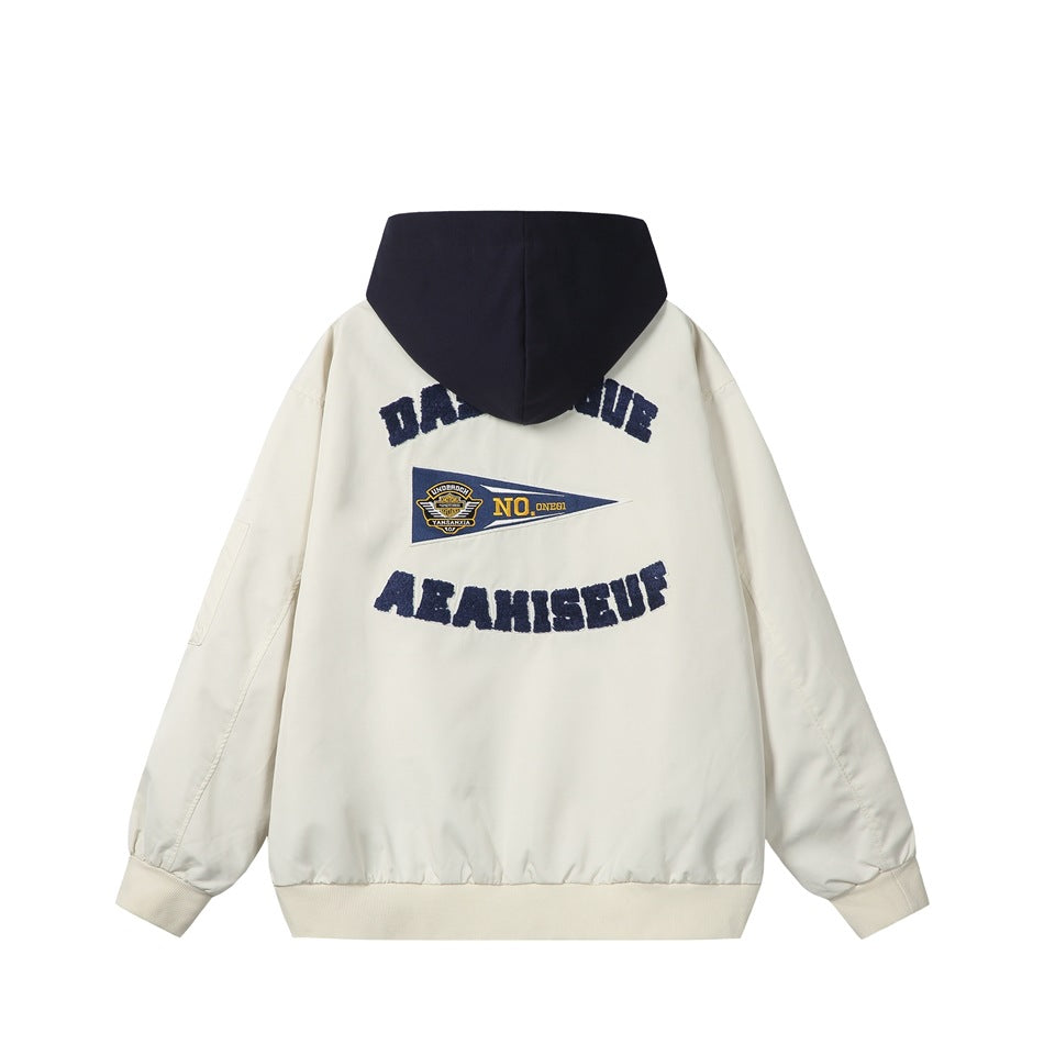 Back view of beige hooded jacket with navy hood, arched navy chenille lettering and a pennant patch