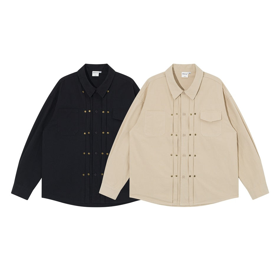 Front view of long-sleeve button-up shirts in black and beige, each with two chest pockets and decorative snaps.