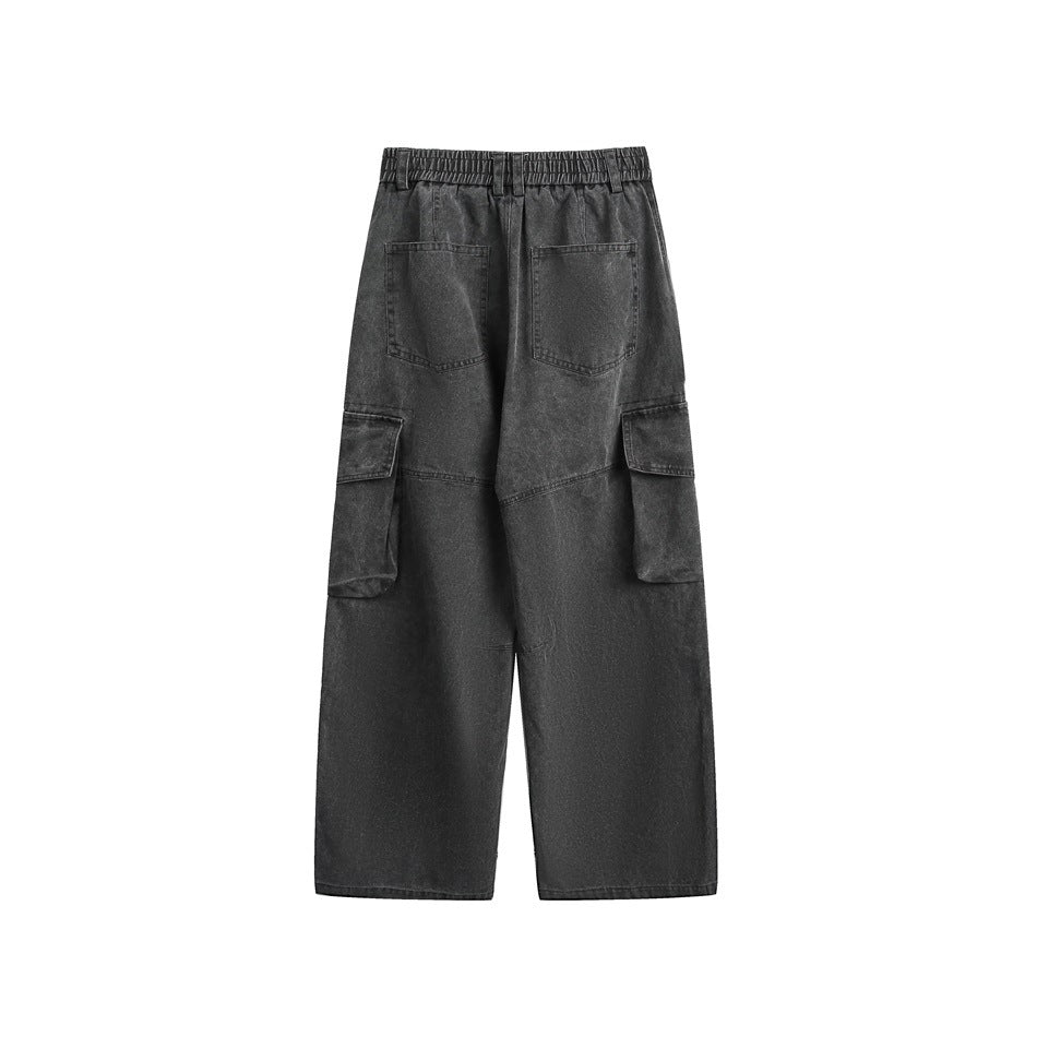 Back view of black-gray washed cargo pants with two patch back pockets, elastic waist and side cargo pockets