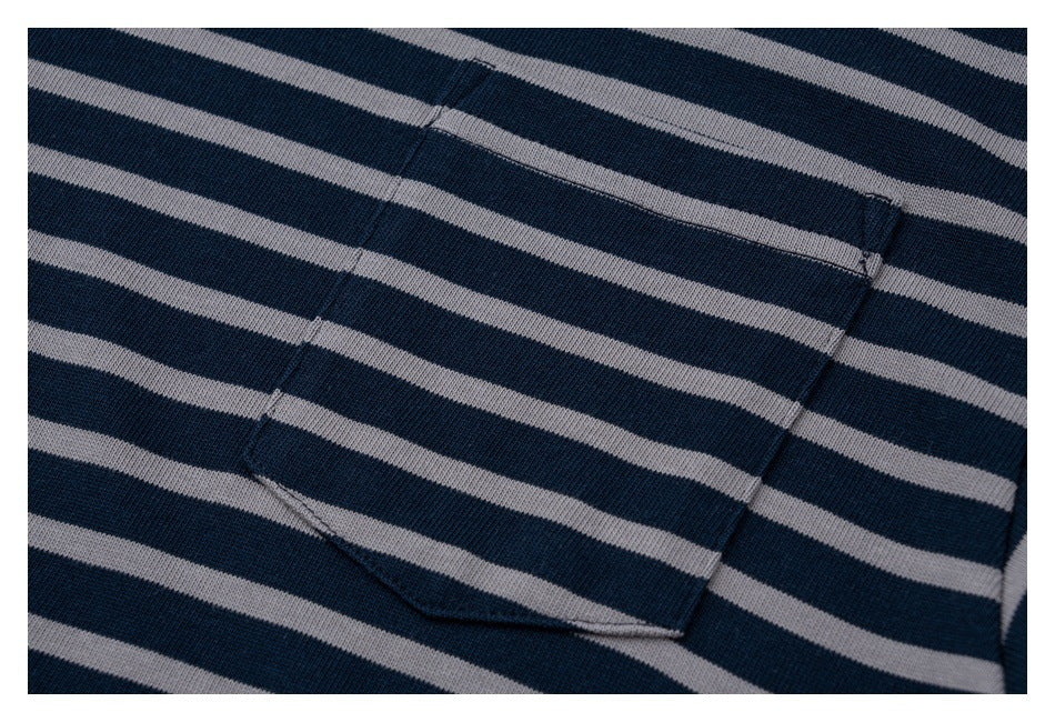 Close-up of the navy and gray stripes and chest pocket stitching.