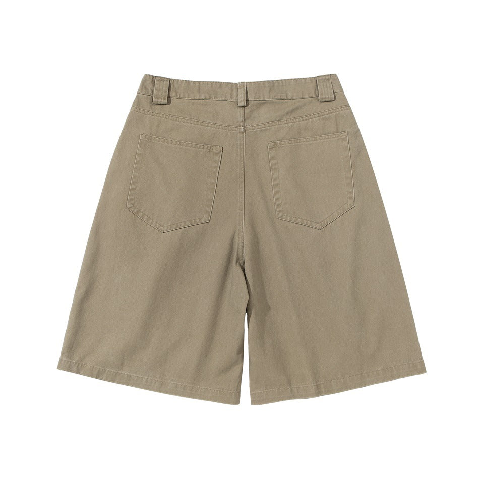 Back of khaki wide-leg knee-length shorts showing two patch pockets and waistband tabs
