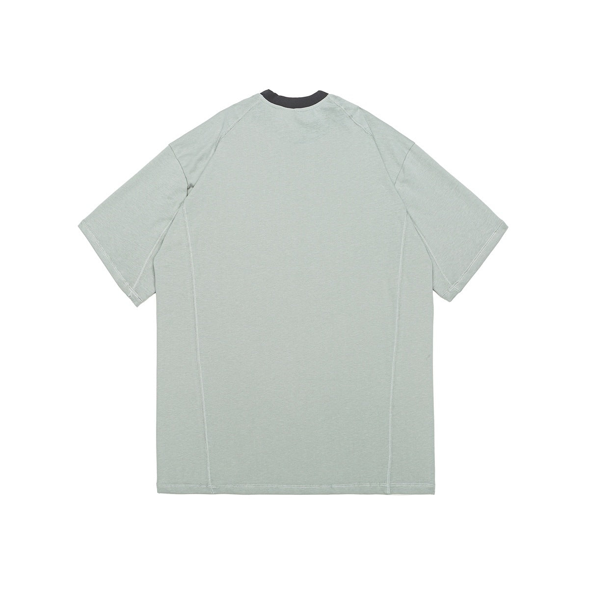 Back view of a pale sage short-sleeve shirt with a dark crew neck and curved seam panels.