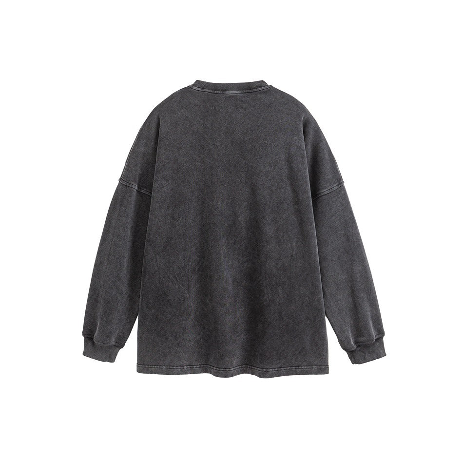 Back view of a washed charcoal crewneck sweatshirt with dropped shoulders and ribbed cuffs and hem.