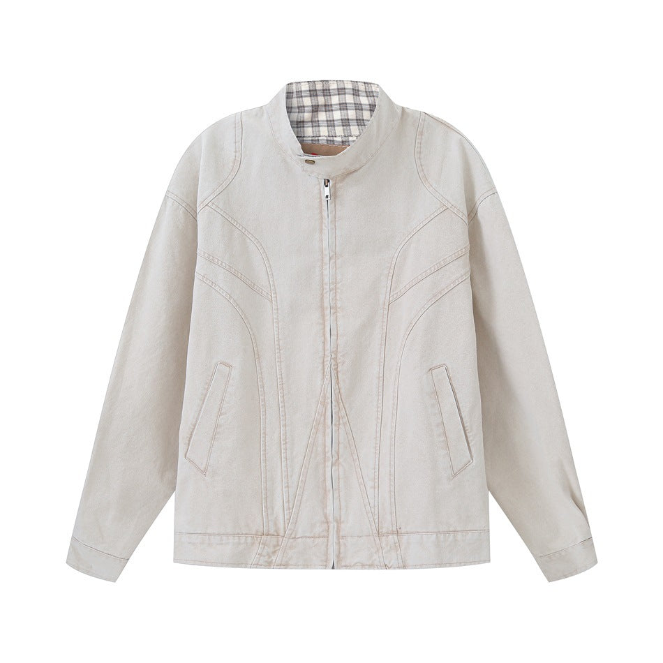 Light khaki washed zip-up jacket with stand collar, curved panel seams, slanted pockets and plaid collar lining, flat lay