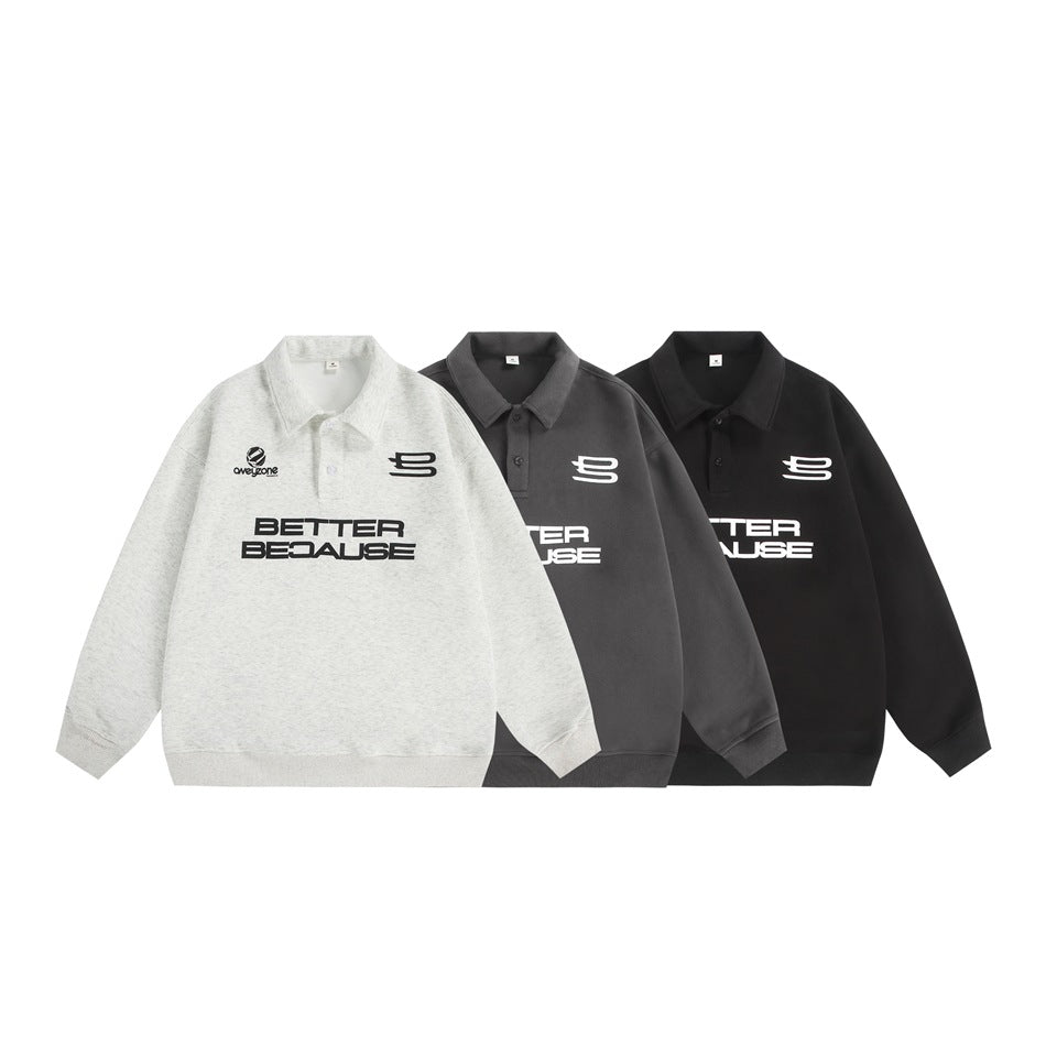 Three polo-collar sweatshirts in light gray, dark gray and black with front graphic prints, laid flat side by side