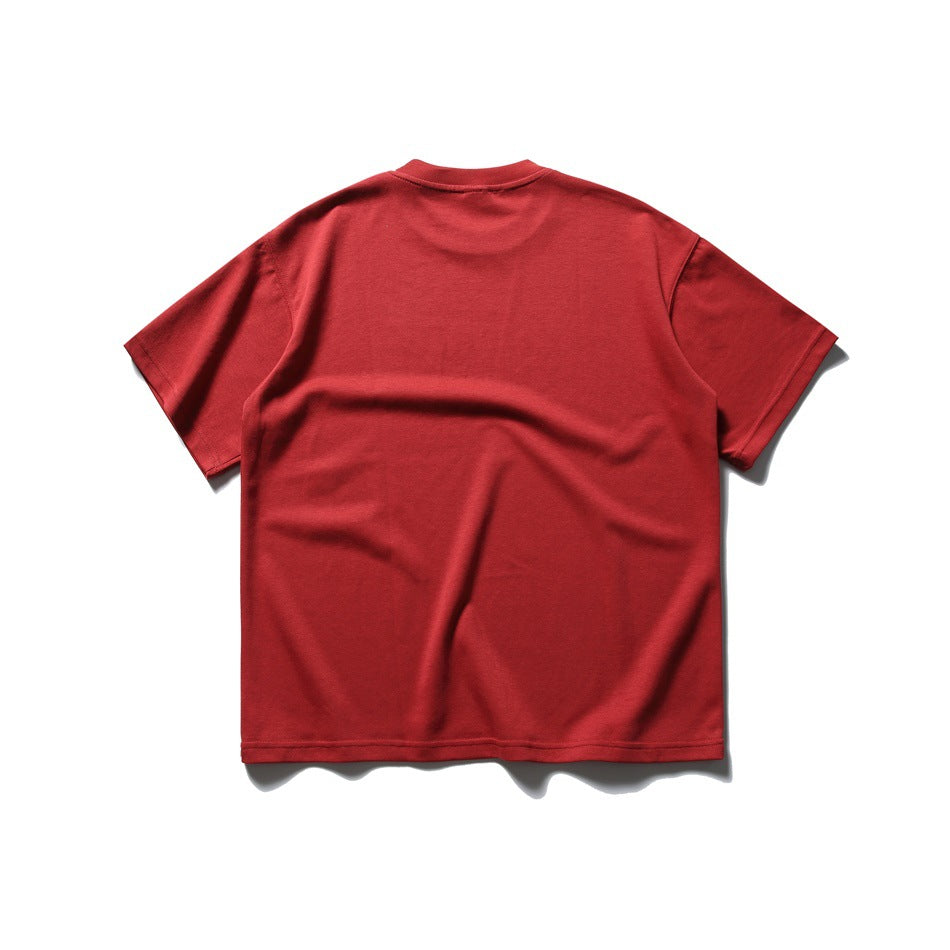 Back view of a plain red short-sleeve crew-neck T-shirt, flat lay