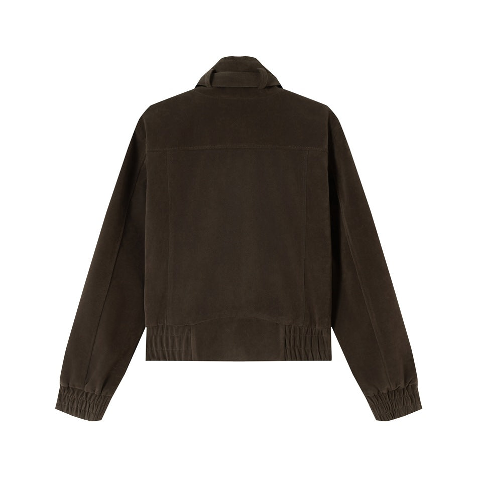 Back view of a dark brown jacket with a short stand collar, back yoke, and gathered cuffs and hem.