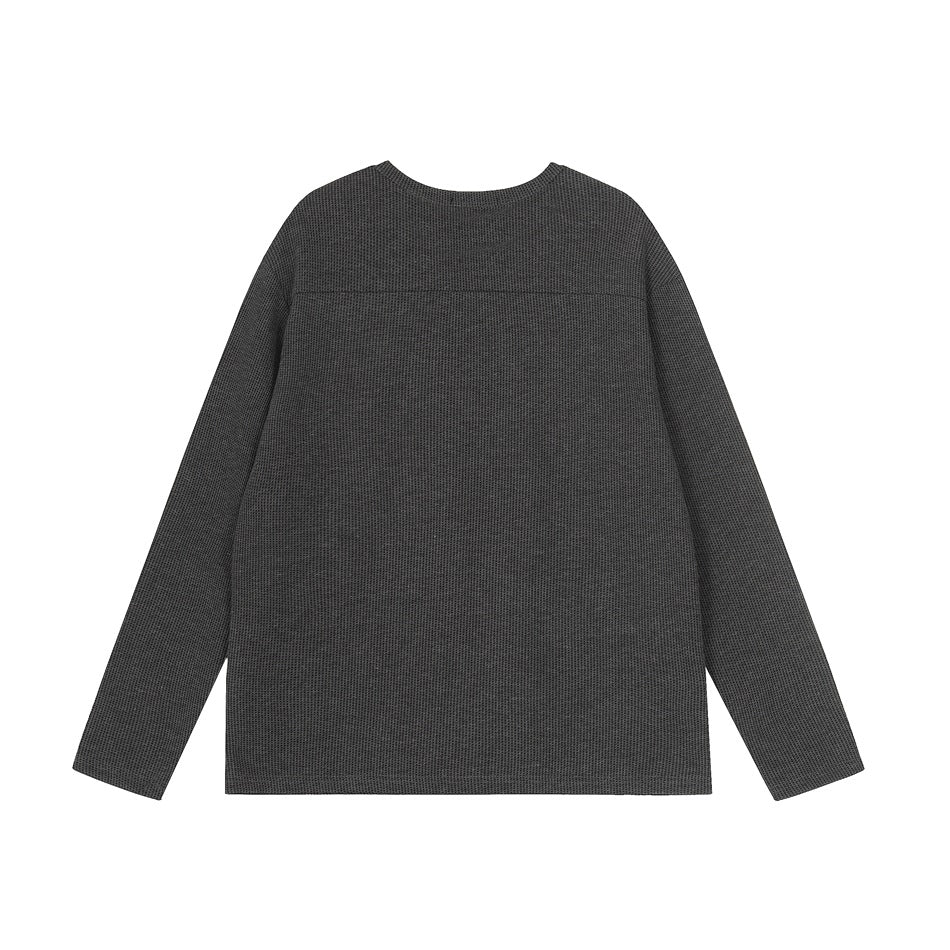Back view of a charcoal long-sleeve crew-neck shirt laid flat on a white background.