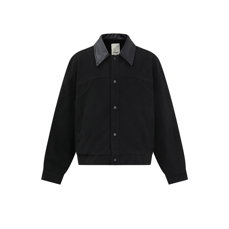 Black button-front cropped jacket with contrast black leather-look collar, front flat view