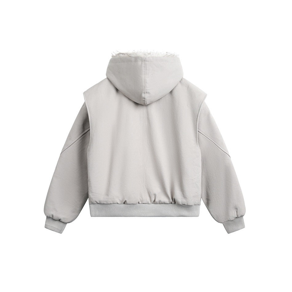 Back view of a light beige hooded jacket with long sleeves and ribbed cuffs and hem.