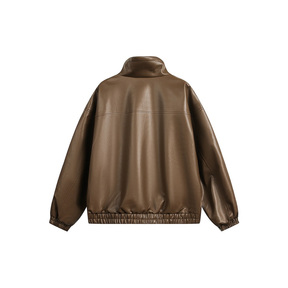 Back view of a dark brown jacket with a raised collar, dropped shoulders, long sleeves, and an elasticated hem and cuffs.