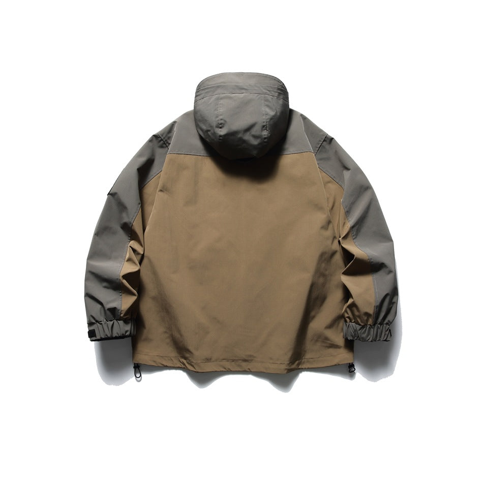 Back view of a gray-and-tan hooded jacket with a tan body and gray hood and sleeves.