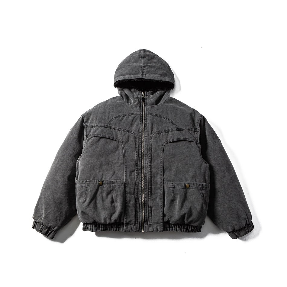 Black washed hooded zip jacket with chest seam detailing, two snap flap pockets and elastic cuffs, flat lay