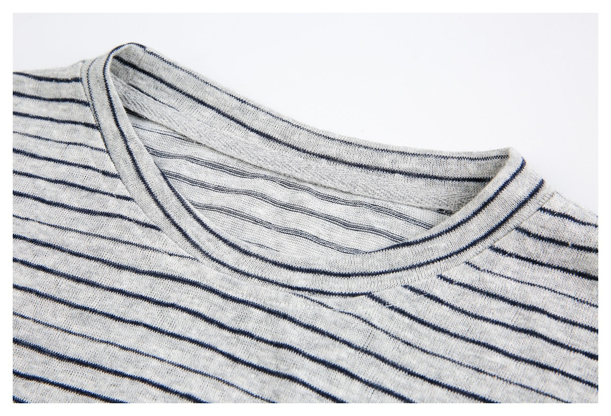Close-up of the striped shirt's crew neckline and ribbed collar.