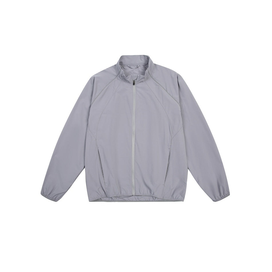 Gray zip-up stand-collar jacket with raglan sleeves and side pockets, flat lay front view