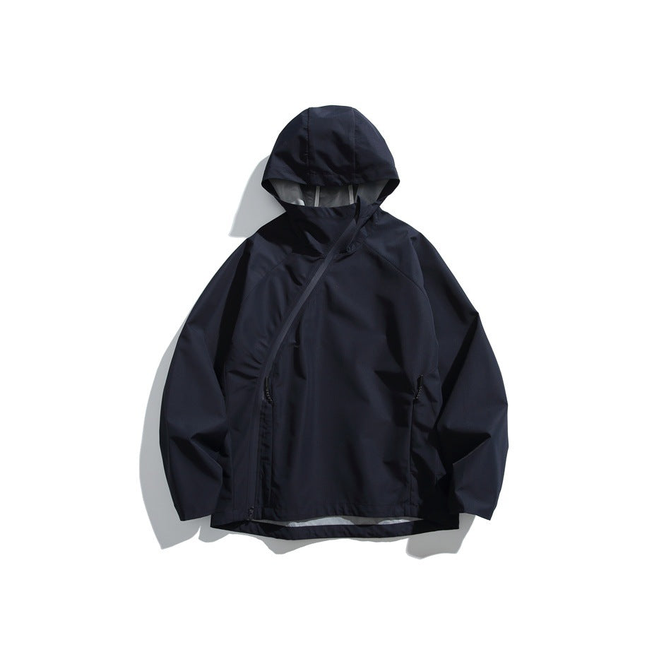 Navy hooded jacket with diagonal front zipper closed, raglan sleeves and zippered front pockets on a white background