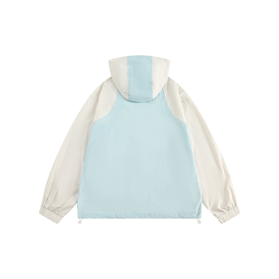 Back of an off-white and light blue hooded jacket with drawcord hem toggles, flat lay