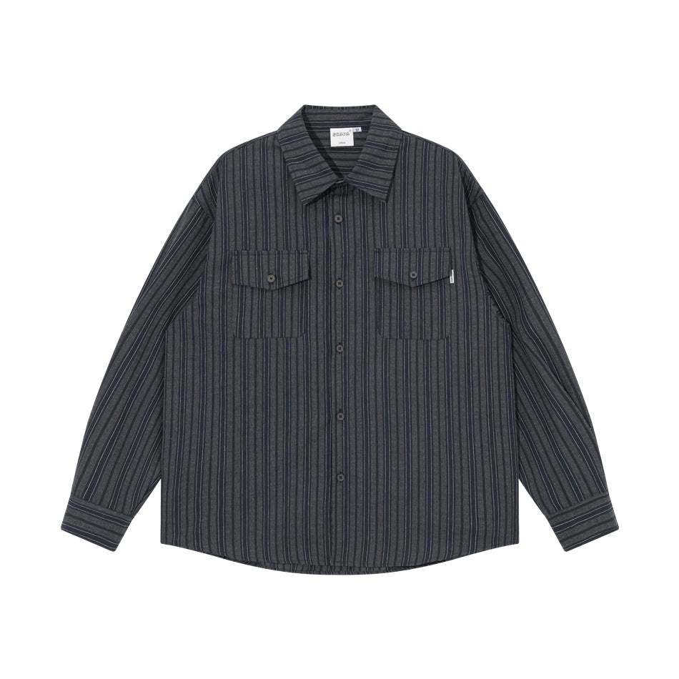Dark blue pinstriped long-sleeve button-up shirt with two flap chest pockets, flat lay front view