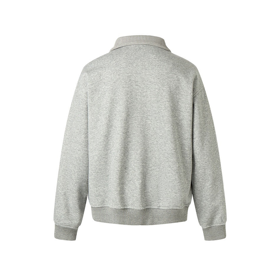 Back view of a light gray zip-up jacket with long sleeves, ribbed cuffs, hem, and collar.