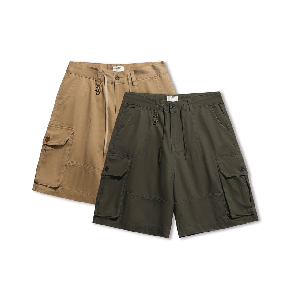 Front views of cargo shorts in tan and dark olive, with drawstring waists and flap pockets.