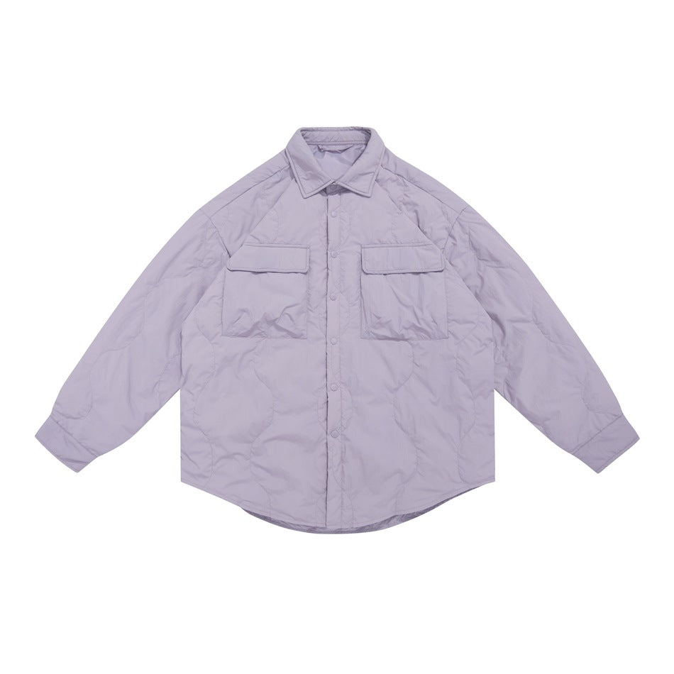 Light purple quilted shirt-style jacket with flap chest pockets and snap front, flat lay