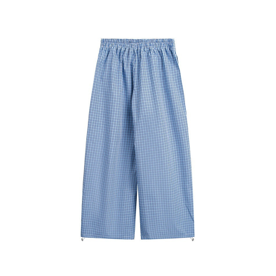 Full-length blue-and-white checked wide-leg pants with an elastic waistband, shown flat against a white background.