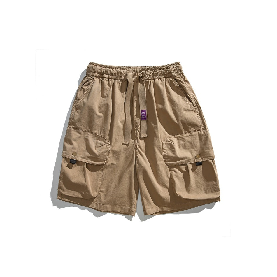 Khaki cargo shorts flat lay with drawstring waistband, flap cargo pockets and purple label