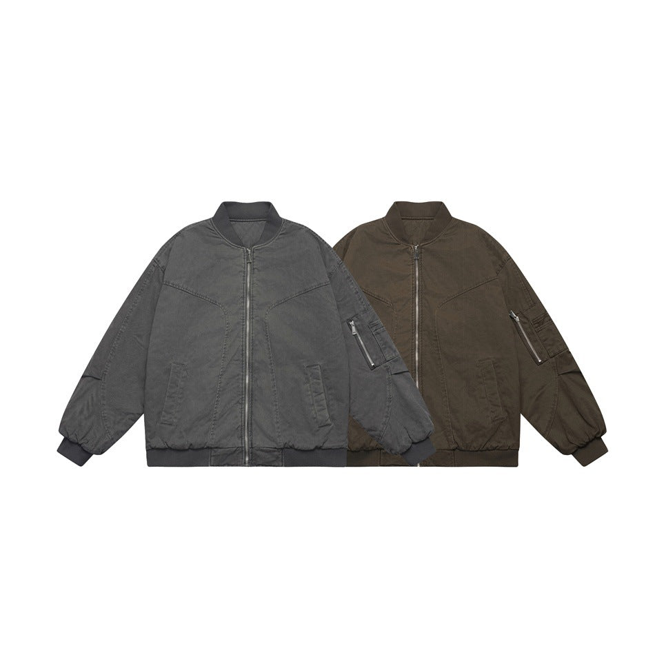 Two front-view bomber jackets in charcoal gray and dark olive, with zip fronts and sleeve pockets.