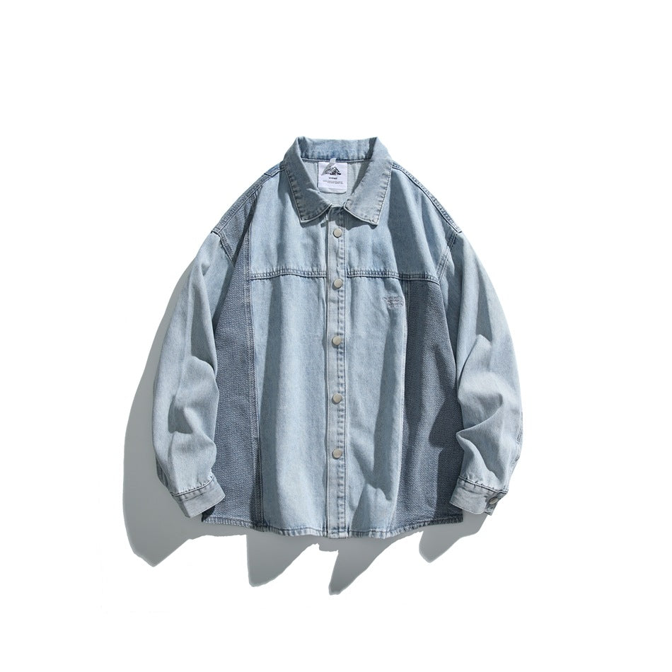 Light blue patchwork denim jacket flat lay with collar, snap buttons and darker side panels