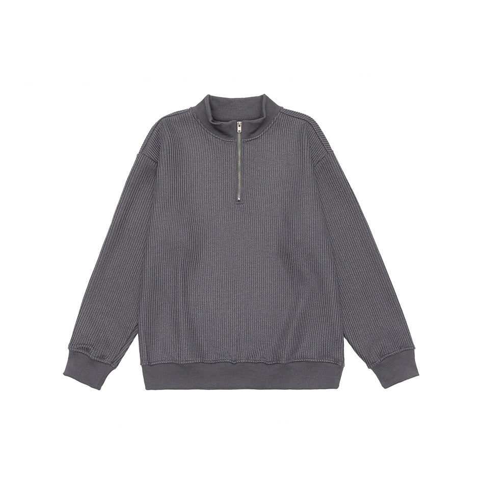 Gray half-zip stand-collar ribbed pullover laid flat, front view