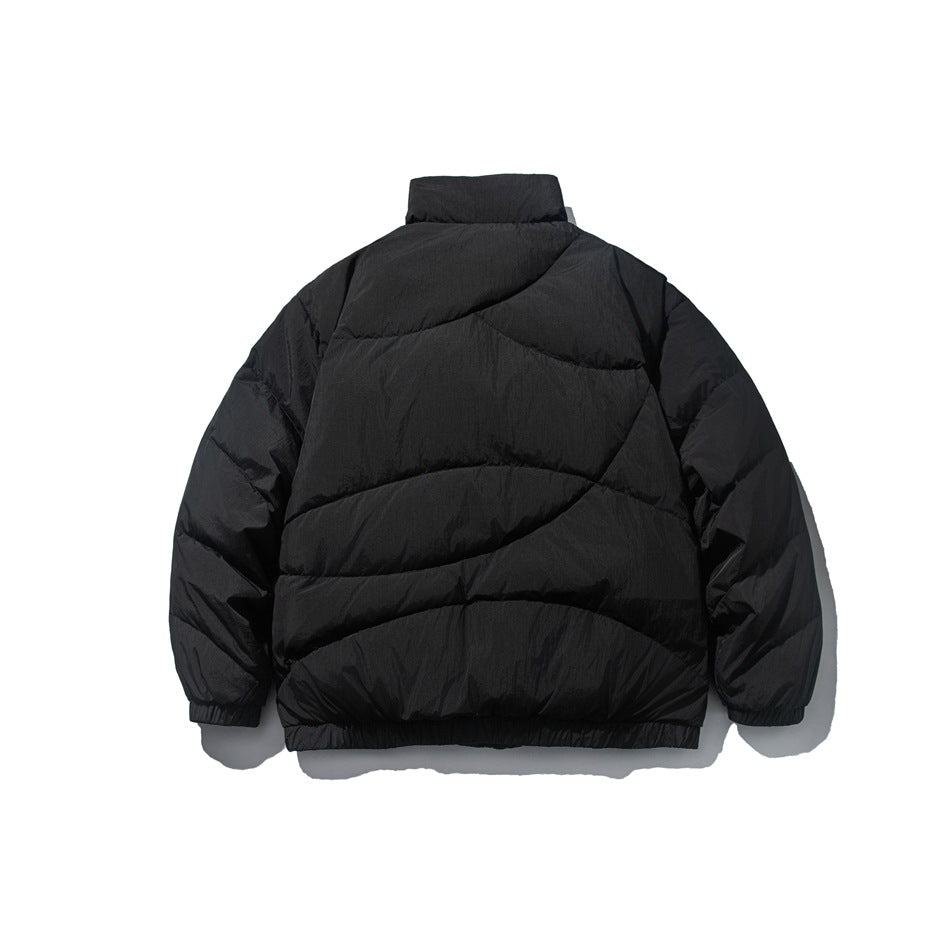Back view of a black padded jacket with a high collar and curved quilted panels.