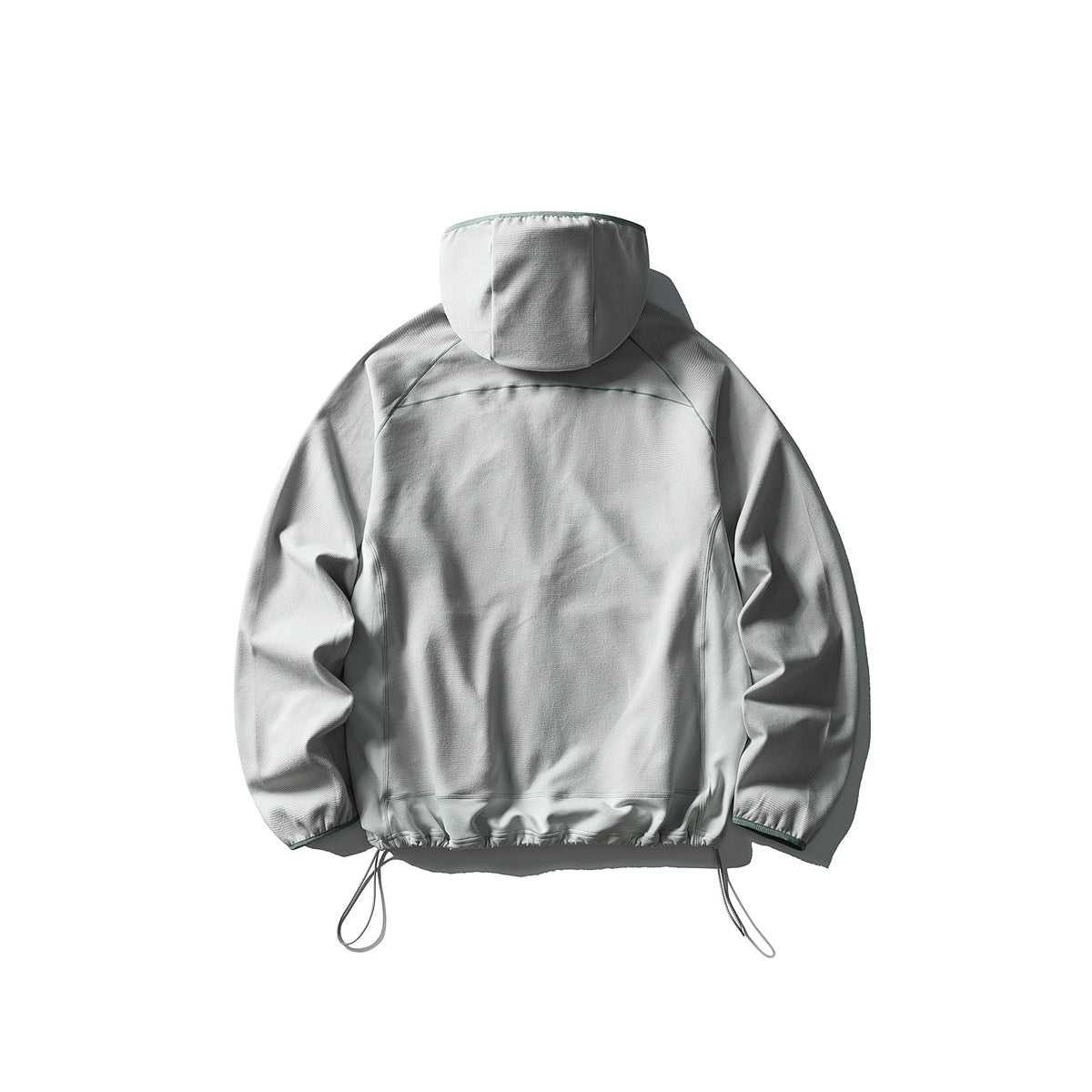 Rear view of a light gray hooded jacket with subtle green seam accents and drawcords at the hem.