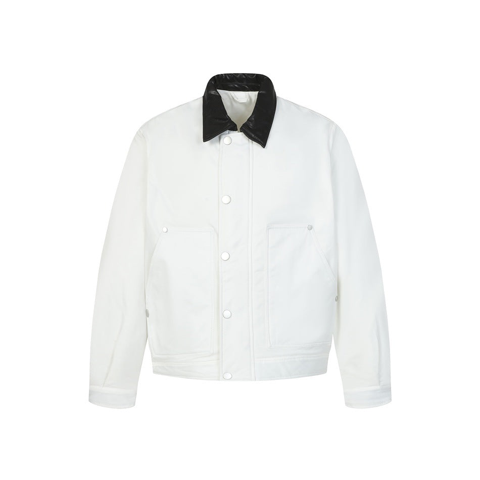 White jacket with black collar, snap front, large patch pockets, flat lay front view