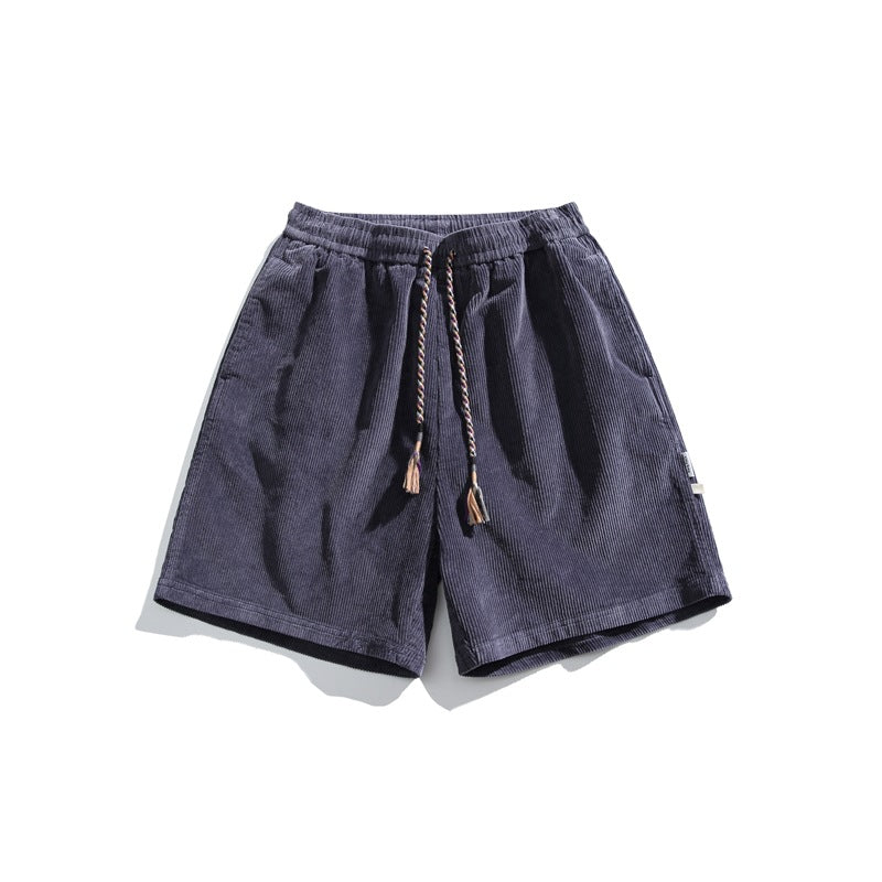 Haze blue corduroy shorts with elastic waist and braided drawcord, front flat lay
