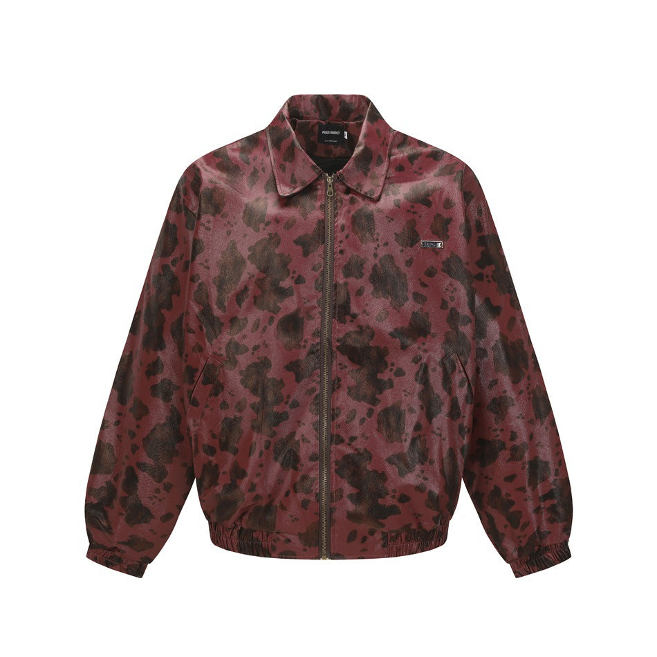 Red zip-front collared jacket with dark brown animal-spot print, elastic cuffs and hem, flat front view