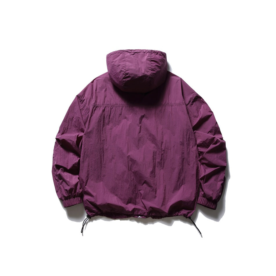 Back view of a plum purple hooded jacket with elastic cuffs and adjustable drawcord hem.