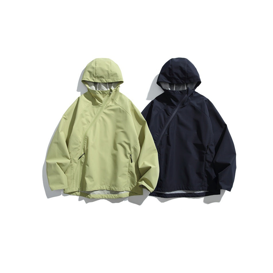 Two hooded jackets shown from the front: one pale green and one dark navy, each with angled front zippers.