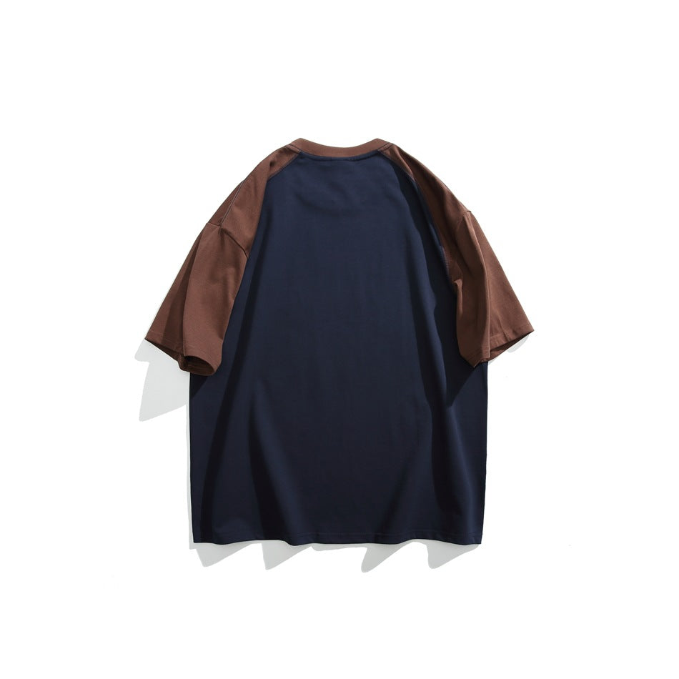 Back view of a color-block T-shirt laid flat, with a navy body and brown raglan sleeves.