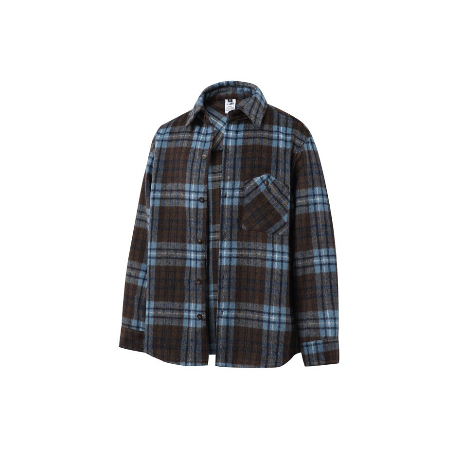 Blue and brown plaid shirt with the front placket slightly open, angled flat lay view