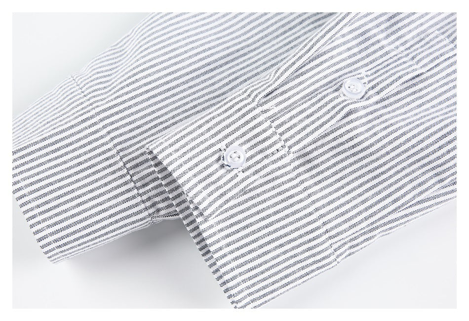 Close-up of a white and navy striped button placket with two white buttons and visible stitching.