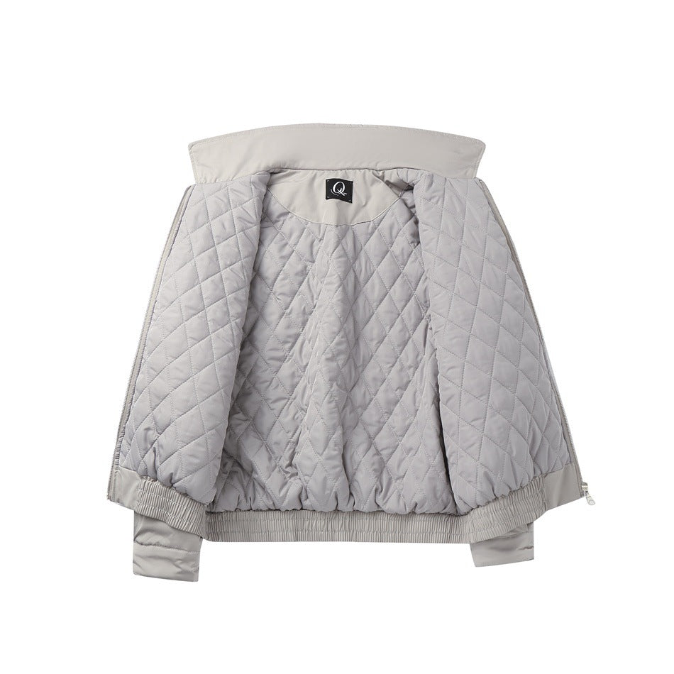 Light gray jacket opened to show its diamond-quilted lining and inner collar.