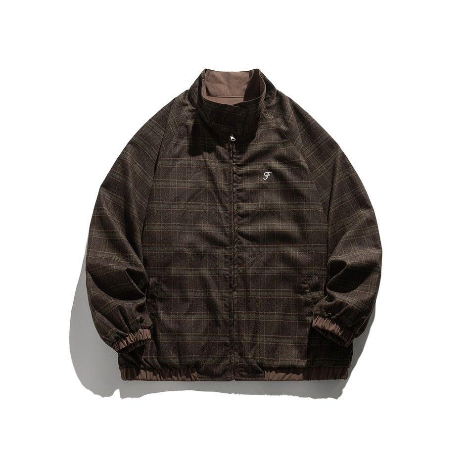 Front view of a dark brown plaid zip jacket with a stand collar, elastic cuffs and hem, and a small chest emblem.