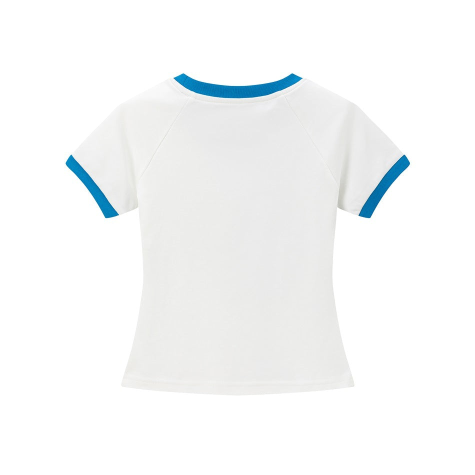 Back view of white cropped raglan tee with blue ribbed collar and sleeve cuffs, plain with no print