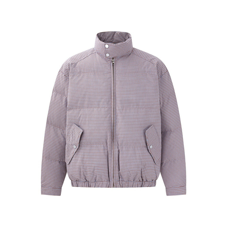 Orange-toned check quilted jacket with stand collar, front zip, flap pockets and elastic hem, front view